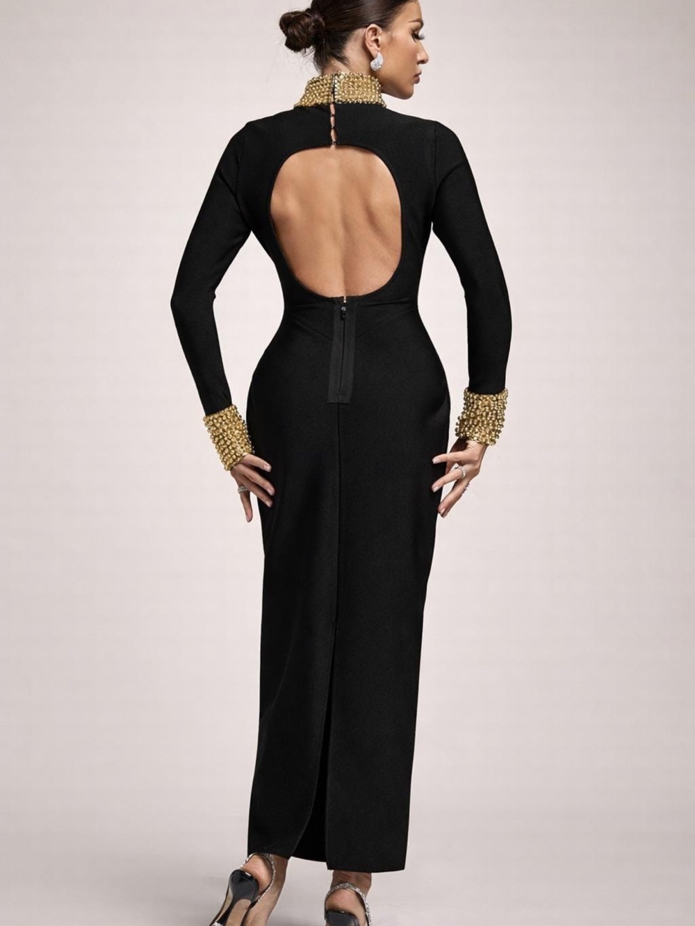 Elegant Black Long-Sleeve Evening Gown with Gold Accents - Picture 3 of 4